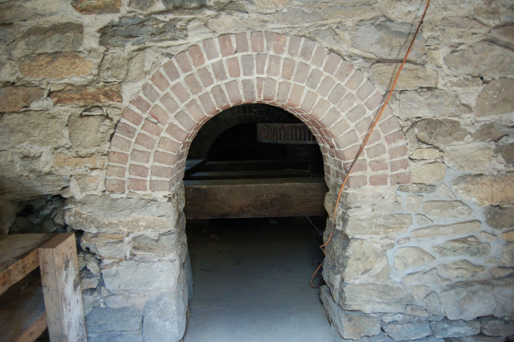 Centuries old archway in the cellar of the Mill